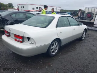 2000 Lexus ES 300 with VIN JT8BF28G3Y0246877, listed as a IAAI auction lot 40365916 with 153,569 mi miles. Bid and sale history available at carsss.com. Image 4.