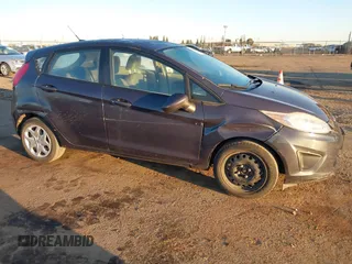 2013 Ford Fiesta S with VIN 3FADP4TJ8DM132523, listed as a IAAI auction lot 41700402 with 53,835 mi miles and . Bid and sale history available at DreamBid. Image 6.