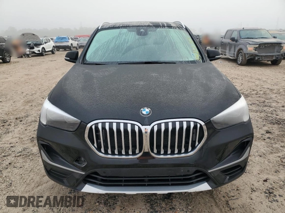 2021 BMW X1 xDrive28i with VIN WBXJG9C07M5T06155, listed as a Copart auction lot 84222754 with 18,466 mi miles and Salvage Title. Bid and sale history available at carsss.com. Image 5.