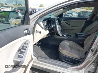 2013 Kia Optima LX with VIN KNAGM4A71D5414691, listed as a IAAI auction lot 41916576 with 245,851 mi miles. Bid and sale history available at carsss.com. Image 5.