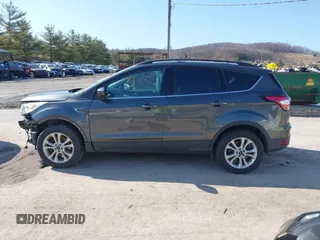 2017 Ford Escape SE with VIN 1FMCU9G99HUD03370, listed as a IAAI auction lot 41700809 with 136,575 mi miles. Bid and sale history available at carsss.com. Image 15.