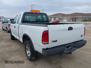 2003 Ford F-150 XL with VIN 2FTRX18W03CB12800, listed as a IAAI auction lot 41897027 with 1 mi miles. Bid and sale history available at carsss.com. Image 3.