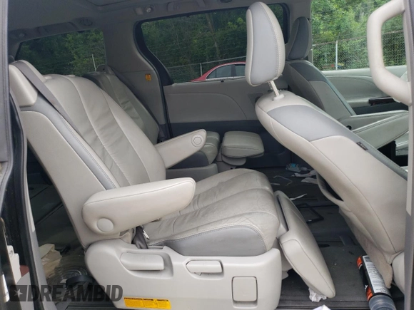2011 Toyota Sienna XLE with VIN 5TDDK3DC8BS020059, listed as a Copart auction lot 62954985 with 219,974 mi miles and Salvage title. Bid and sale history available at DreamBid. Image 11.