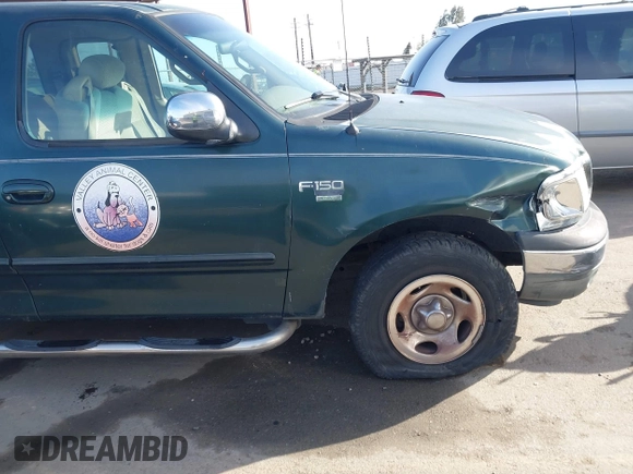 2002 Ford F-150 XL with VIN 1FTRX17L42NA52360, listed as a IAAI auction lot 41886697 with 121,346 mi miles. Bid and sale history available at carsss.com. Image 6.