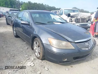 2007 Acura RL Technology z VIN JH4KB16627C002988, wystawiony jako IAAI lot #42298771 z przebiegiem 230 613 mil mil oraz . Historia ofert i sprzedaży dostępna na DreamBid. Obrazek 1.