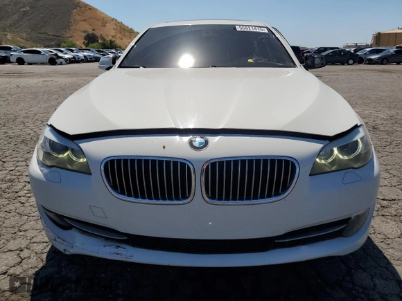 2013 BMW 5 Series 535i with VIN WBAFR7C56DC823291, listed as a Copart auction lot 56621415 with 100,423 mi miles and Salvage title. Bid and sale history available at DreamBid. Image 5.