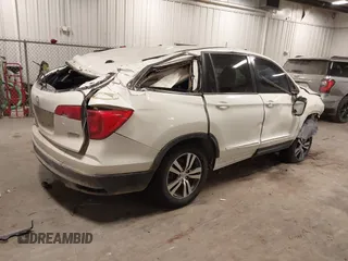 2016 Honda Pilot EX-L with VIN 5FNYF6H79GB019440, listed as a IAAI auction lot 41375747 with 199,535 mi miles. Bid and sale history available at carsss.com. Image 4.