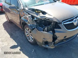 2019 Buick Envision Essence with VIN LRBFXCSA3KD043383, listed as a IAAI auction lot 42031599 with 96,754 mi miles and . Bid and sale history available at carsss.com. Image 6.