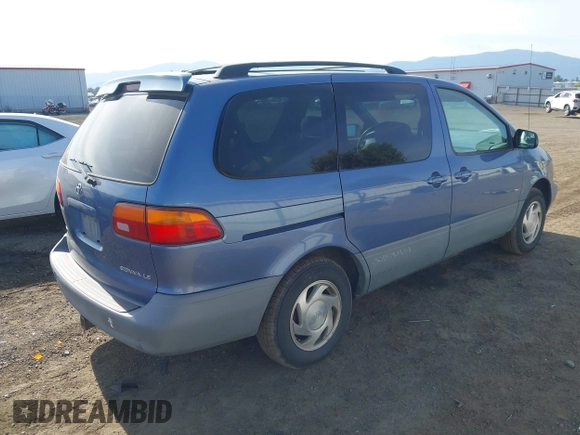 2000 Toyota Sienna LE with VIN 4T3ZF13C2YU183815, listed as a IAAI auction lot 42462319 with 217,175 mi miles and . Bid and sale history available at DreamBid. Image 4.