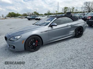 2012 BMW 6 Series 650i with VIN WBALZ3C59CDL73205, listed as a Copart auction lot 48920085 with 58,824 mi miles and Salvage Title. Bid and sale history available at carsss.com. Image 1.