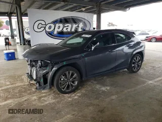 2023 Lexus UX 250h F Sport z VIN JTHB9JBHXP2065586, wystawiony jako Copart lot #59037755 z przebiegiem 23 620 mil mil oraz Szkoda całkowita • Salvage title. Historia ofert i sprzedaży dostępna na DreamBid. Obrazek 1.