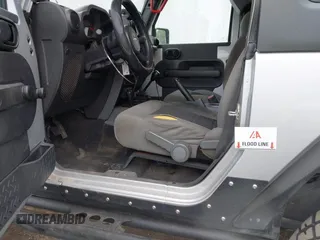 2007 Jeep Wrangler X with VIN 1J4FA24117L142513, listed as a IAAI auction lot 42314284 with 70,213 mi miles and . Bid and sale history available at DreamBid. Image 6.