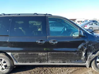 2004 Kia Sedona LX with VIN KNDUP131X46601278, listed as a IAAI auction lot 41472321 with 202,212 mi miles. Bid and sale history available at carsss.com. Image 14.