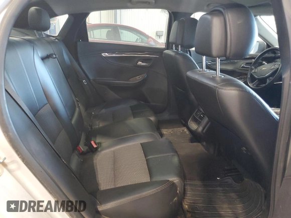 2014 Chevrolet Impala LT z VIN 2G1115SL8E9118955, wystawiony jako Copart lot #56299715 z przebiegiem 217 840 mil mil oraz Szkoda całkowita • Salvage title. Historia ofert i sprzedaży dostępna na DreamBid. Obrazek 10.