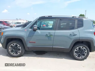 2015 Jeep Renegade Trailhawk with VIN ZACCJBCT8FPB33586, listed as a IAAI auction lot 42590207 with 127,168 mi miles and . Bid and sale history available at DreamBid. Image 14.