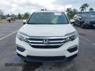 2016 Honda Pilot EX-L with VIN 5FNYF5H50GB043294, listed as a IAAI auction lot 41930654 with 92,728 mi miles and . Bid and sale history available at DreamBid. Image 12.
