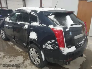 2014 Cadillac SRX Luxury Collection with VIN 3GYFNEE31ES561037, listed as a IAAI auction lot 41373540 with 126,108 mi miles. Bid and sale history available at carsss.com. Image 3.