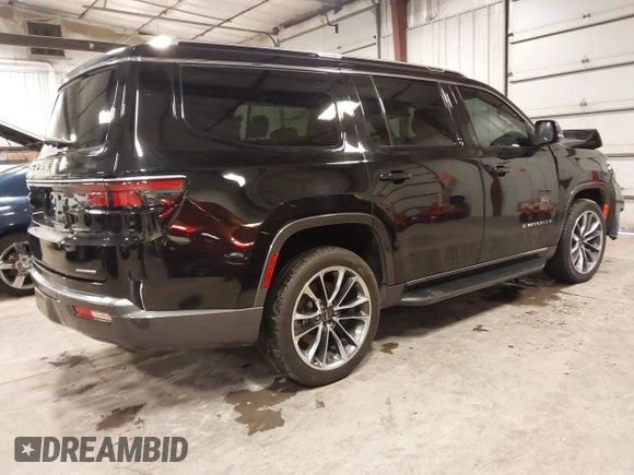 2022 Jeep Wagoneer Series II with VIN 1C4SJVBT5NS127476, listed as a IAAI auction lot 41807474 with 48,703 mi miles and . Bid and sale history available at DreamBid. Image 4.