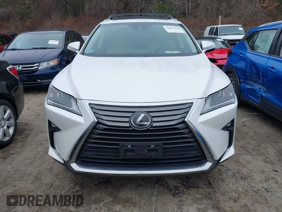 2018 Lexus RX 350 with VIN 2T2BZMCA7JC144576, listed as a IAAI auction lot 41811166 with 127,548 mi miles and . Bid and sale history available at DreamBid. Image 13.