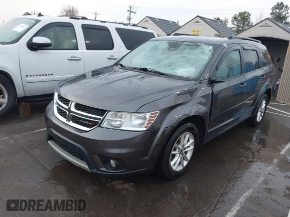2015 Dodge Journey SXT with VIN 3C4PDCBB7FT735721, listed as a IAAI auction lot 41775824 with 113,446 mi miles and . Bid and sale history available at DreamBid. Image 2.