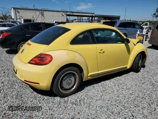 2012 Volkswagen Beetle 2.5L PZEV with VIN 3VWJP7AT0CM628771, listed as a Copart auction lot 47974775 with 70,940 mi miles and Salvage Title. Bid and sale history available at carsss.com. Image 3.