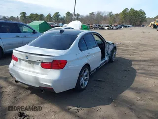 2015 BMW 3 Series 335i xDrive with VIN WBA3B9G56FNR94353, listed as a IAAI auction lot 41759393 with 121,136 mi miles and . Bid and sale history available at carsss.com. Image 4.
