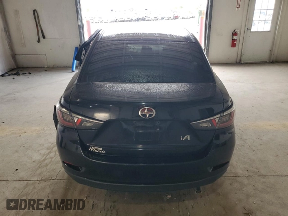 2016 Scion iA z VIN 3MYDLBZV3GY126714, wystawiony jako Copart lot #53955955 z przebiegiem 79 349 mil mil oraz Szkoda całkowita • Salvage title. Historia ofert i sprzedaży dostępna na DreamBid. Obrazek 6.