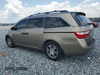 2012 Honda Odyssey LX with VIN 5FNRL5H25CB109643, listed as a Copart auction lot 55951805 with 128,341 mi miles and Clean Title. Bid and sale history available at carsss.com. Image 2.