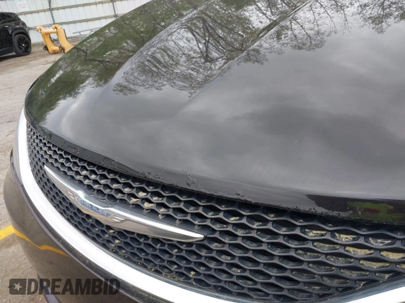 2017 Chrysler Pacifica Touring with VIN 2C4RC1DG9HR620973, listed as a IAAI auction lot 42250448 with 108,863 mi miles and . Bid and sale history available at DreamBid. Image 19.