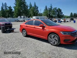 2021 Volkswagen Jetta SEL with VIN 3VWE57BUXMM099832, listed as a Copart auction lot 58607035 with 71,519 mi miles and Salvage title. Bid and sale history available at DreamBid. Image 13.