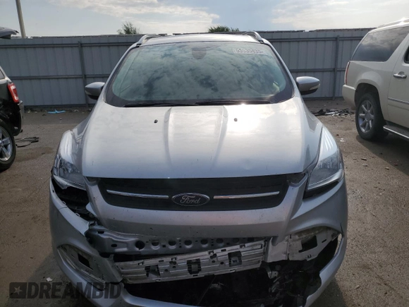 2015 Ford Escape Titanium with VIN 1FMCU0JX5FUA08248, listed as a Copart auction lot 53635435 with 120,010 mi miles and Salvage Title. Bid and sale history available at DreamBid. Image 5.
