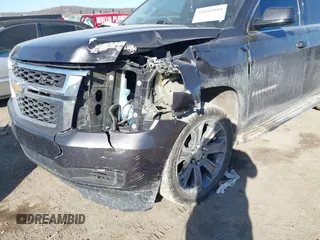 2016 Chevrolet Suburban LS with VIN 1GNSKGKC5GR411894, listed as a IAAI auction lot 41693585 with 144,449 mi miles. Bid and sale history available at carsss.com. Image 6.