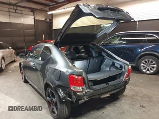 2012 Scion tC with VIN JTKJF5C7XC3034998, listed as a IAAI auction lot 41591632 with 171,121 mi miles. Bid and sale history available at carsss.com. Image 3.
