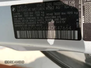 2004 BMW 7 Series 745Li with VIN WBAGN63444DS47664, listed as a Copart auction lot 71046044 with 144,598 mi miles and Salvage title. Bid and sale history available at DreamBid. Image 14.