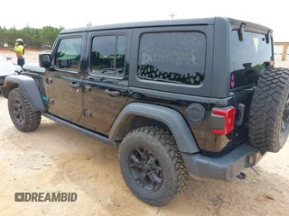 2020 Jeep Wrangler Unlimited Sport S with VIN 1C4HJXDN9LW218468, listed as a IAAI auction lot 42490190 with 114,542 mi miles and . Bid and sale history available at DreamBid. Image 3.