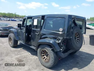 2017 Jeep Wrangler Unlimited Rubicon Recon with VIN 1C4BJWFG7HL525709, listed as a IAAI auction lot 42569577 with 119,560 mi miles and . Bid and sale history available at DreamBid. Image 3.