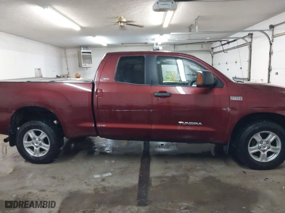 2008 Toyota Tundra 4WD Truck with VIN 5TBBV54168S497390, listed as a IAAI auction lot 41626116 with 231,007 mi miles. Bid and sale history available at carsss.com. Image 13.