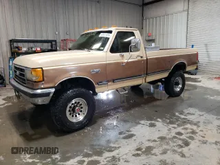 1989 Ford F-350 with VIN 1FTHF36G0KNA88965, listed as a Copart auction lot 42921324 with 92,521 mi miles and Salvage title. Bid and sale history available at DreamBid. Image 1.
