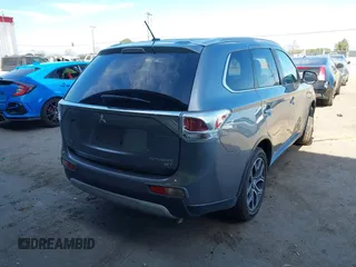 2015 Mitsubishi Outlander GT with VIN JA4JZ4AX1FZ005879, listed as a IAAI auction lot 41701299 with 212,805 mi miles and . Bid and sale history available at DreamBid. Image 4.
