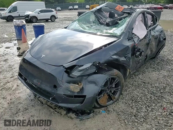 2024 Tesla Model Y Long Range z VIN 7SAYGDEEXRA324517, wystawiony jako Copart lot #55274615 z przebiegiem Nie podano mil oraz Szkoda całkowita • Salvage title. Historia ofert i sprzedaży dostępna na DreamBid. Obrazek 14.