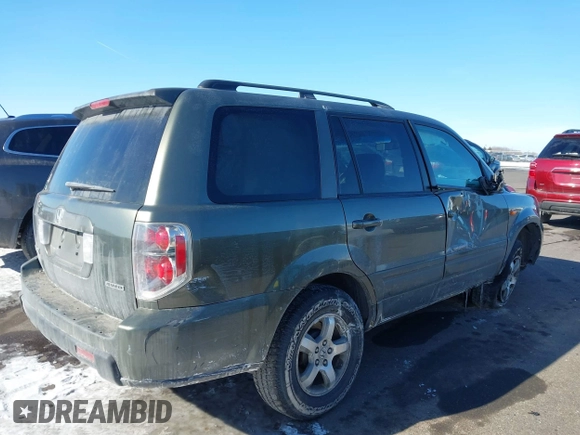 2006 Honda Pilot EX-L with VIN 5FNYF18596B016974, listed as a IAAI auction lot 41634049 with 161,687 mi miles and . Bid and sale history available at DreamBid. Image 4.