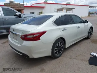 2018 Nissan Altima 2.5 SR with VIN 1N4AL3AP2JC140548, listed as a IAAI auction lot 41968993 with 112,000 mi miles. Bid and sale history available at carsss.com. Image 4.