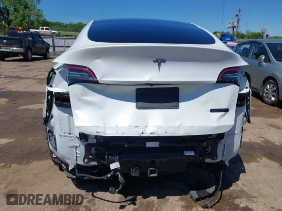 2020 Tesla Model Y Long Range z VIN 5YJYGDEE0LF035248, wystawiony jako IAAI lot #42162191 z przebiegiem 115 533 mil mil oraz . Historia ofert i sprzedaży dostępna na DreamBid. Obrazek 17.