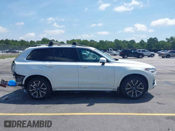 2016 Volvo XC90 T6 Momentum with VIN YV4A22PK8G1034321, listed as a IAAI auction lot 42424745 with 141,771 mi miles and . Bid and sale history available at DreamBid. Image 14.