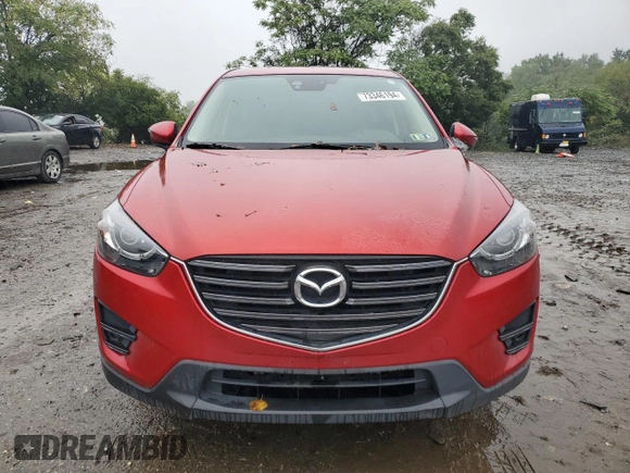 2016 Mazda CX-5 Grand Touring with VIN JM3KE4DY3G0713283, listed as a Copart auction lot 73346194 with 135,382 mi miles and Salvage Title. Bid and sale history available at carsss.com. Image 5.