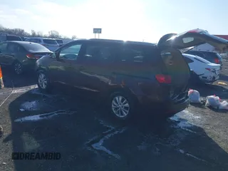 2015 Kia Sedona LX with VIN KNDMB5C14F6059569, listed as a IAAI auction lot 41564739 with 167,275 mi miles. Bid and sale history available at carsss.com. Image 3.