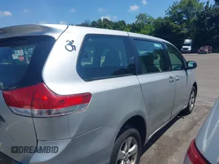 2014 Toyota Sienna L with VIN 5TDZK3DC9ES518653, listed as a IAAI auction lot 42767591 with 261,730 mi miles and . Bid and sale history available at DreamBid. Image 13.