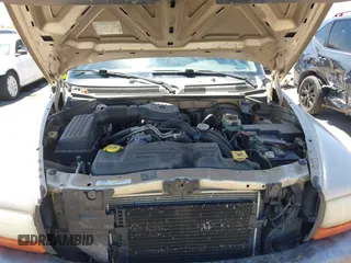 2002 Dodge Dakota with VIN 1B7FL16X72S642881, listed as a IAAI auction lot 42153560 with 220,917 mi miles and . Bid and sale history available at carsss.com. Image 10.