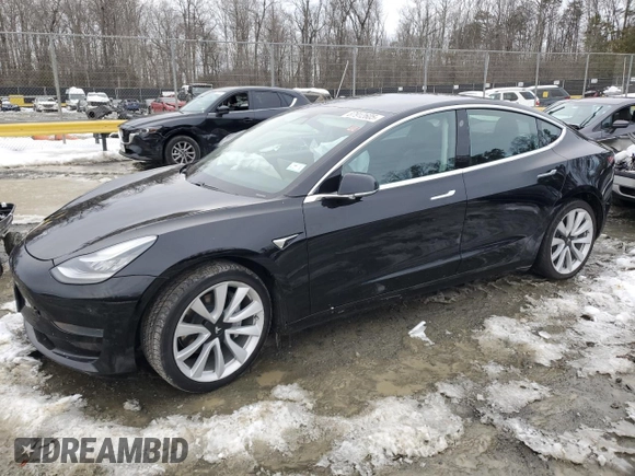 2020 Tesla Model 3 Standard Range Plus with VIN 5YJ3E1EAXLF661031, listed as a Copart auction lot 87912605 with Not Provided miles and Salvage Title. Bid and sale history available at DreamBid. Image 1.