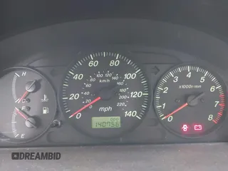 2000 Mazda Protege DX with VIN JM1BJ2221Y0239987, listed as a IAAI auction lot 42092488 with 140,756 mi miles and . Bid and sale history available at DreamBid. Image 7.